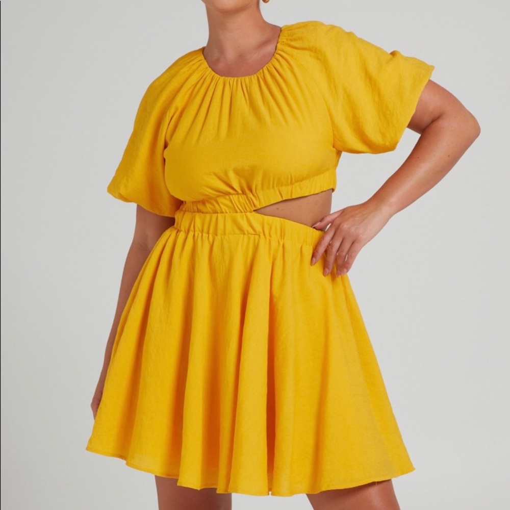 Showpo. HADLEY PUFF SLEEVE CUT OUT MINI DRESS IN YELLOW